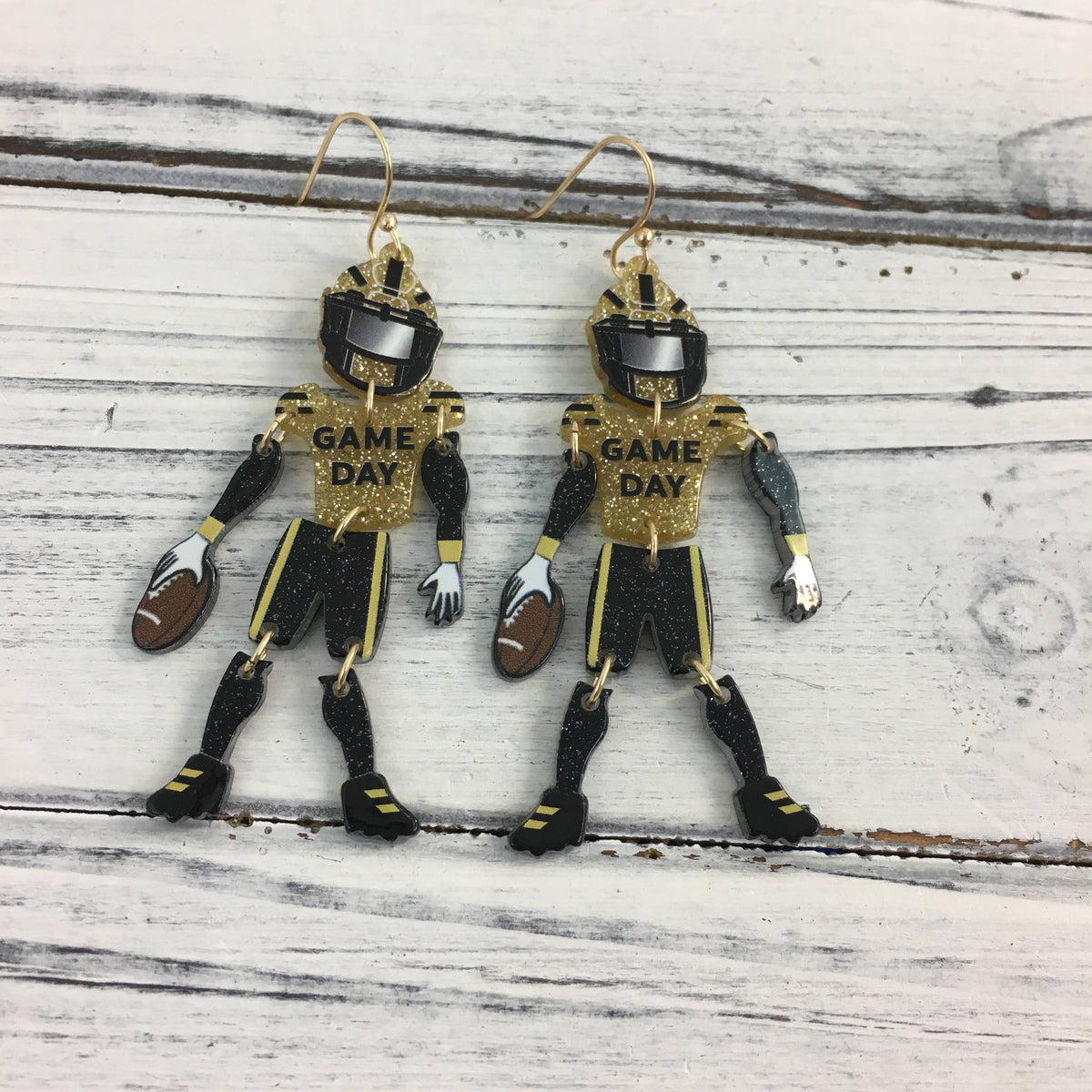 Black and Gold Glitter Football Player Earrings